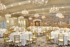 a large banquet room with tables and chairs