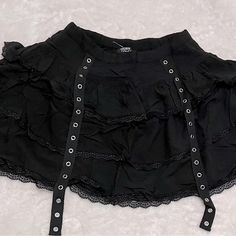 Black Skirt From Hot Topic, Mid Length Lace Frills Black Punk Skort For Summer, Black Punk Style Skort For Summer, Black Edgy Skort For Alternative Fashion, Black Punk Mini Skirt For Festival, Punk Style Black Mini Skirt For Festival, Black High Waist Gothic Skort, Gothic High Waist Black Skort, Black Gothic High-waist Skort, Gothic Black High Waist Skort