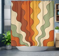 a shower curtain with an abstract design in orange, green and yellow colors on it