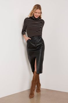 Give your summer-to-fall wardrobe a stylish edge with this vegan leather midi skirt by Sanctuary. This Triple Threat Skirt features a front slit, seamed detailing, and slant front pockets. Style with a tee or a knit pullover. | SANCTUARY Women's Triple Threat Skirt, Size 24, Black Vegan Leather Midi Skirt, Feminine Blouses, Leather Midi Skirt, Black Leather Skirts, Triple Threat, Fashion 2024, Tres Chic, Knit Pullover, Retail Therapy