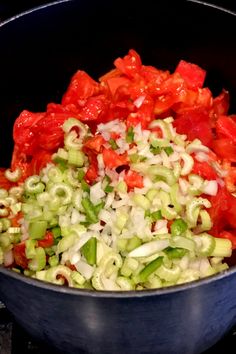 chopped vegetables are mixed together in a bowl