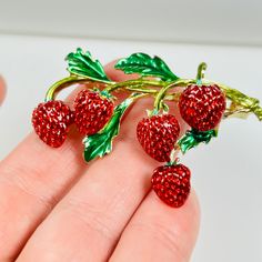 Introducing a delightful piece of nature-inspired adornment - the Berry Adornment: Red Strawberry Enamel Brooch Pin. Embark on a journey through a vibrant strawberry patch, where each crimson gem glistens with the promise of summer's sweetness. Nestled amidst emerald leaves, these luscious berries beckon with their irresistible charm, whispering tales of sun-kissed days and childhood dreams. Adorn yourself with this delightful brooch, a tiny treasure that captures the essence of nature's most be Strawberry Delight, Childhood Dreams, Kiss Day, Strawberry Patch, Red Strawberry, Enamel Brooch, Nature Inspired Jewelry, Tiny Treasures, Inspired Jewelry