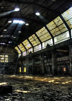 the inside of an abandoned building with lots of windows