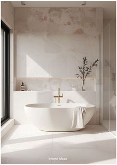 a white bath tub sitting next to a window