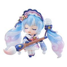 an anime figurine is holding a stick and wearing a blue outfit with white hair