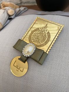 a close up of a medal on a pillow