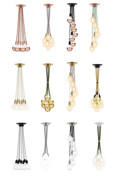 a bunch of different types of lights hanging from the ceiling in various shapes and sizes