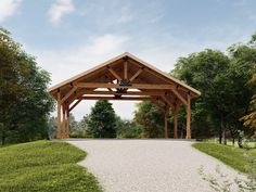 a wooden structure sitting on top of a lush green field