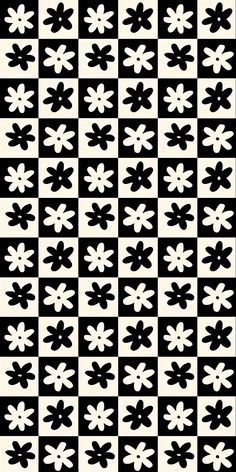 a black and white checkerboard pattern with small flowers on the bottom half of it