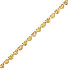 With the sweetest details, the heart stampato bracelet is ready to steal your heart. Created in warm 10K gold, this choice features a row of mini puffed hearts. Polished to a bright shine, this 7.25-inch bracelet secures with a lobster claw clasp. Valentine's Day Yellow Gold Charm Bracelet, Valentine's Day Yellow Gold Tarnish-resistant Bracelet, Valentine's Day Gold-plated Heart Bracelet, Dainty Heart-shaped Yellow Gold Charm Bracelet, Valentine's Day Yellow Gold-plated Heart Bracelet, Peoples Jewellers, Puffed Heart, Heart Bracelet, 10k Gold