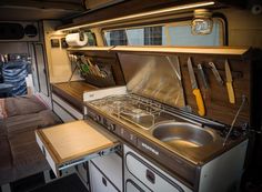 the kitchen is clean and ready to be used as a living area in an rv