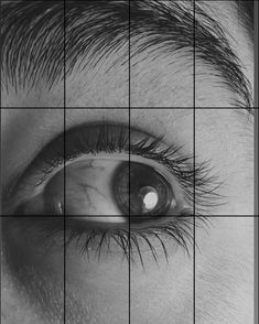 a man's eye is shown through the grids