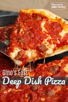 a close up of a slice of deep dish pizza on a pan with the words gino's east above it