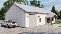 a truck is parked in front of a white building with a garage on the side