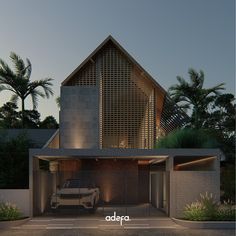 a car is parked in front of a modern house with palm trees around the driveway