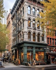 an old building on the corner of a city street