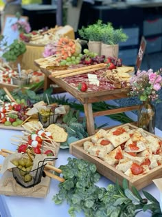 an assortment of appetizers and snacks are on display at a party or gathering