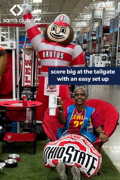 a woman sitting in a chair next to a mascot at a sports store with the caption above it