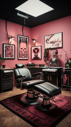 a living room with pink walls and pictures on the wall, black chairs and a red rug