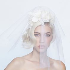 This ultra luxurious headpiece is meticulously crafted by hand. A cluster of seven silk satin organza flowers on a silk headband with veil, each flower is hand sized, cut, embossed, wired and assembled, petal by petal. Comes with a removable silk tulle veil. This item is made-to-order and will ship 2 weeks after order is placed. Headband With Veil, Silk Tulle Veil, Bridal Flower Headband, Under The Veil, Veil Hairstyles, Organza Flowers, Silk Headband, Silk Tulle, Bridal Flower