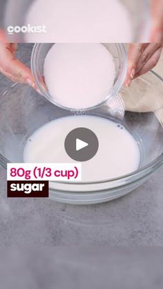 someone mixing ingredients in a bowl on top of a counter with the words, 80g 1 / 3 cup sugar