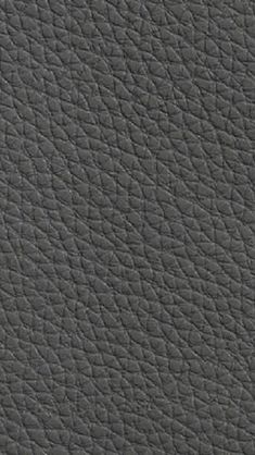 the texture of an upholstered black leather