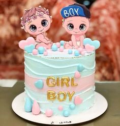 there is a cake that has two babies in it