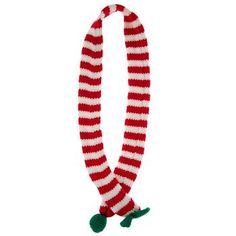 a red and white striped scarf with a green pom - pom