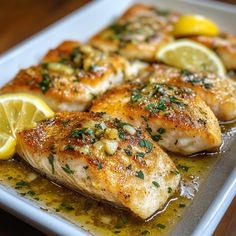 Perfectly Baked Lemon Garlic Butter Fish Lemon Garlic Butter Fish Recipes, Lemon Butter Mahi Mahi, Lemon Butter Garlic Fish, Baked Halibut With Lemon Butter Sauce, Cod With Lemon Butter Sauce, Baked Striper Fish Recipes, Garlic Butter Fish Recipes, Striper Bass Fish Recipes, Flounder Fish Recipes Healthy