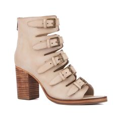 Step stylishly into warmer days with the statement making gladiator style heel. Embrace its caged buckle straps that exude a bold flair, complemented by a stacked block heel for both height and stability. Designed with a convenient back zipper, this sandal merges fashion with function, ensuring effortless wearability. Whether paired with flowing dresses or sleek denim, elevate your ensemble with this standout piece that promises to be the star of your outfit, day or night. Low Block Heel Sandal, Gladiator Flats, Flat Gladiator Sandals, White Sandals Heels, Trending Sandals, Footbed Sandals, Flowing Dresses, Open Toe Shoes, Heel Sandal