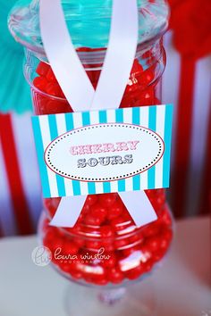 a jar filled with red and blue candies