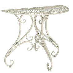 a white table with an intricate design on it's top and bottom half is shown in front of a white background