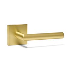 a brass door handle on a white background