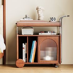 a book shelf with books and magazines on it