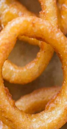 some onion rings sitting on top of a table