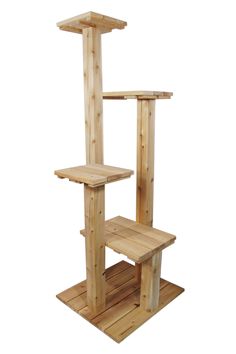 a wooden cat tree with two shelves on each side