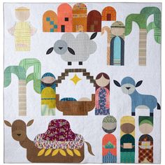 a quilted christmas scene with sheeps and nativity scenes on it's white background