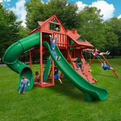 children playing on a green and red play set