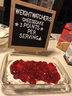 there is a sign that says weight watchers cheesecake points per serving on the table