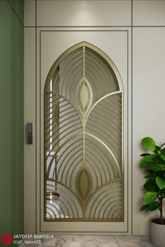 an art deco door with a plant in the corner