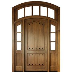 a wooden door with arched glass and wood paneling on the front entrance to a home