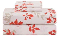 three sheets with red flowers on them