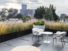 two chairs and a table on a roof