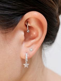 Dainty little stars dangle beneath pave cubic zirconia studded hoops. Half hoop studs make these easier to put on! Shown worn stacked with our 'micro make a wish' studs. • sterling silver posts, rhodium silver filled/22k gold filled focal & charm, cubic zirconia • hoops measure 11mm (just over 3/8") diameter, 19mm (3/4") length with drop• handmade in Toronto, Canada Tiny Star, Earrings Dainty, Jewelry Card, Star Jewelry, Huggie Hoop Earrings, Star Charms, Charm Earrings, Earings Piercings, Or Rose