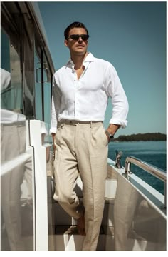 Get ready to sail into summer in style with the essential summer wardrobe for the modern man. Whether you're on land or at sea, these breezy linen pants and classic button down shirt ensure you're ready for any adventure. Complete your look with designer sunglasses and a timeless watch for that perfect summer yacht vibe.   #SummerStyle #YachtLife #MensFashion #LinenShorts #BoatShoes #DesignerSunglasses #StrawHat  Men's Summer Fashion, Men's Summer Style, Men's Summer Outfits, Men's Summer Wardrobe, Men's Beachwear, Men's Summer Lookbook, Men's Summer Trends, Men's Lightweight Clothing, Men's Summer Shirts, Men's Summer Shorts, Men's Summer Accessories, Men's Casual Summer Style, Men's Summer Shoes, Men's Summer Hats, Men's Linen Clothing Mens Fashion Wedding Guest, Office Old Money, Wedding Guest Men, Old Money Fashion, Chique Outfit, Money Fashion, Herren Style, Mens Fashion Wedding