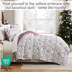 a bed in a bedroom with christmas decorations on the window sill and trees outside