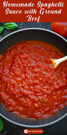 homemade spaghetti sauce with ground beef in a skillet on top of a black table