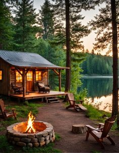 a small cabin with a fire pit in the foreground