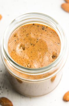 a jar filled with peanut butter sitting on top of a table