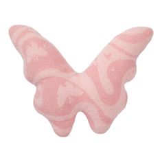 a pink butterfly shaped pillow on a white background